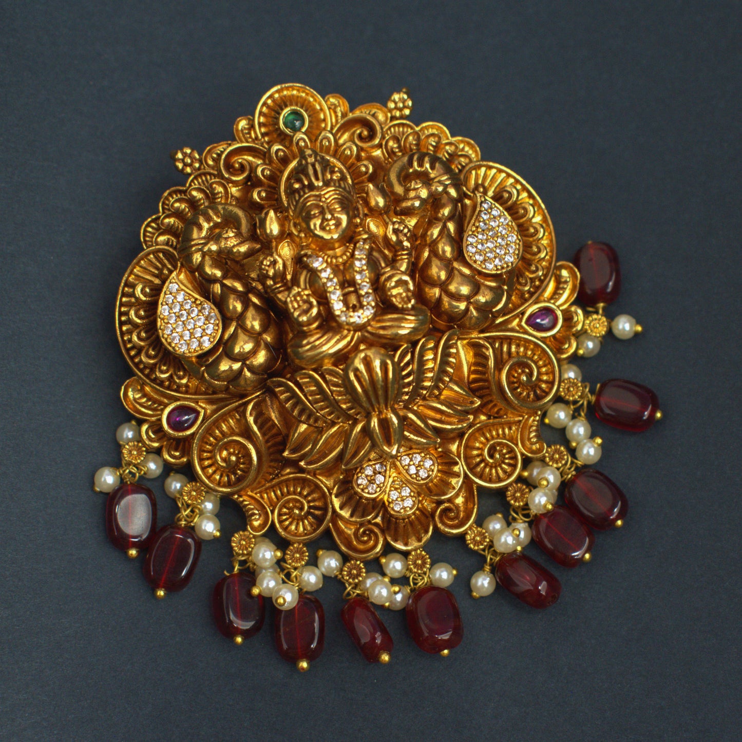 Udbhava Nakshi Lakshmi Temple Pendant in Antique Gold Finish with Maroon Bead Drops