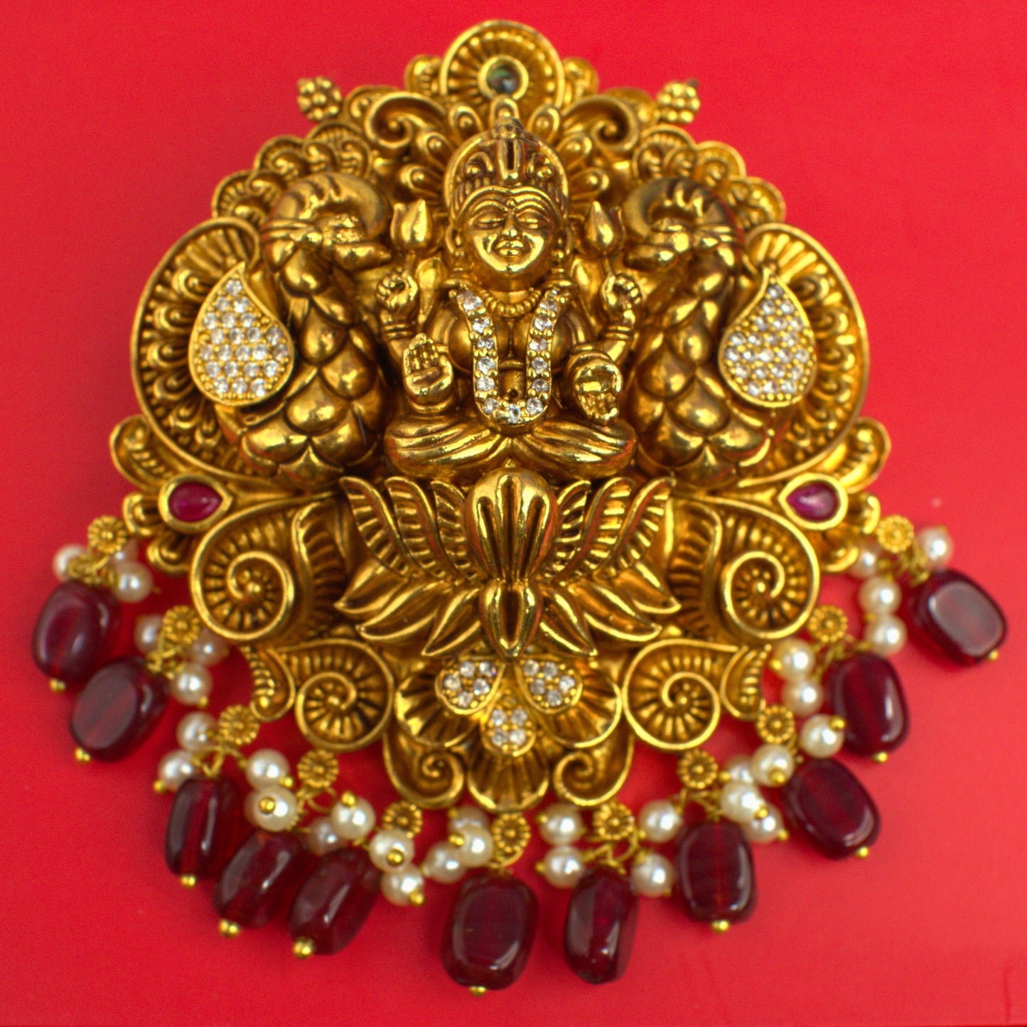 Udbhava Nakshi Lakshmi Temple Pendant in Antique Gold Finish with Maroon Bead Drops