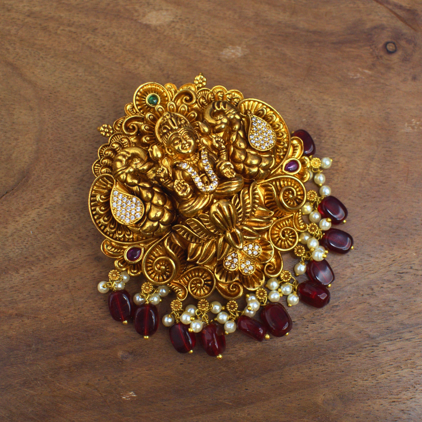 Udbhava Nakshi Lakshmi Temple Pendant in Antique Gold Finish with Maroon Bead Drops