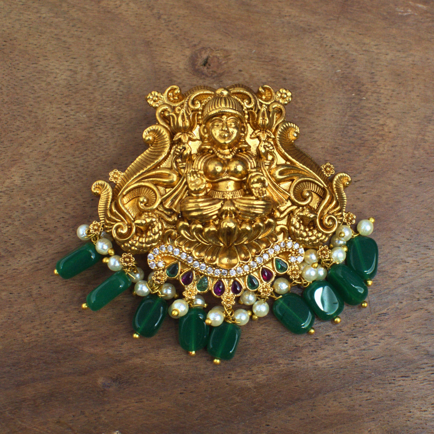 Udbhava Nakshi Lakshmi Temple Pendant in Antique Gold Finish with Green Bead Drops